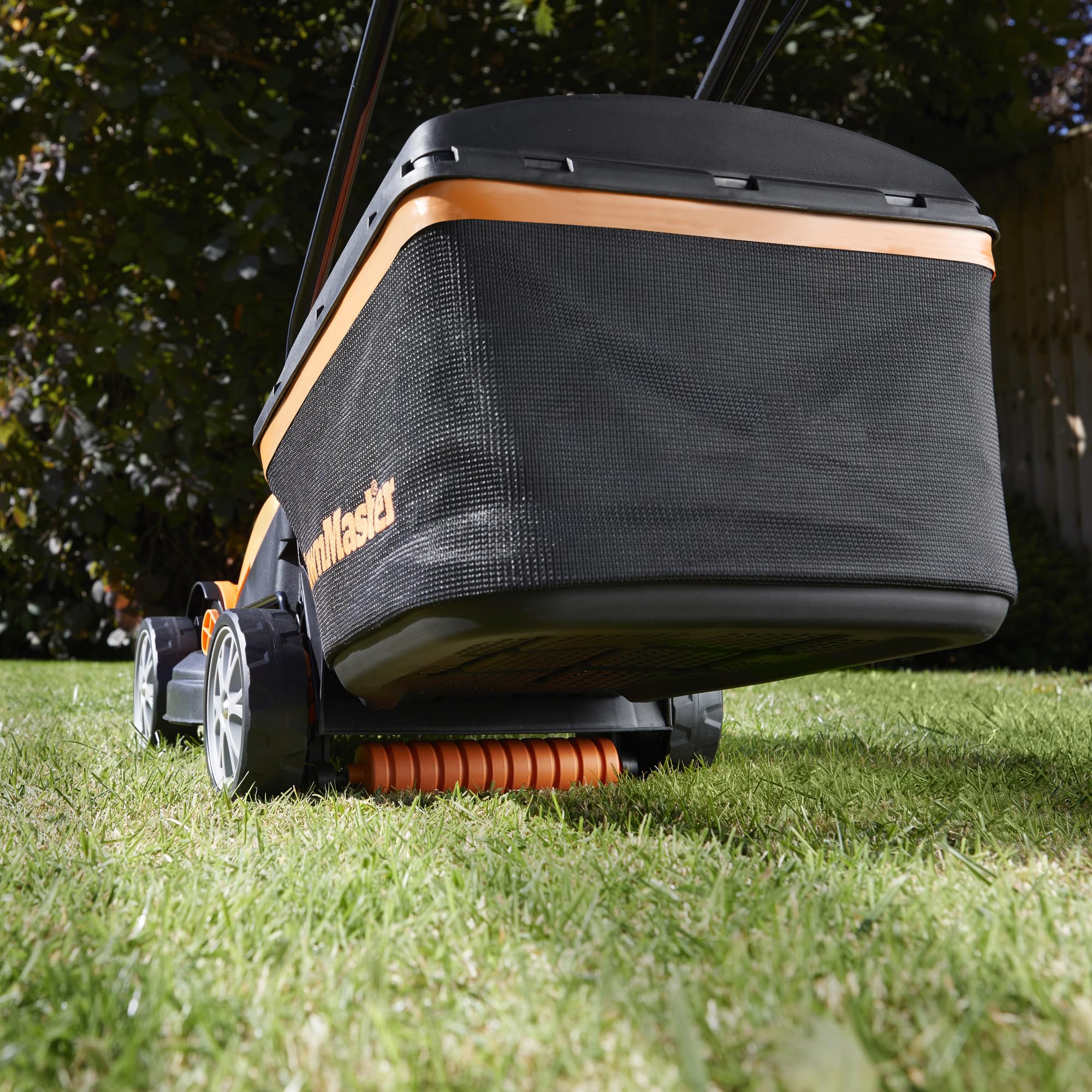 LawnMaster 1200W Electric Lawn Mower with 32cm cutting width, ideal for small lawns. With 5 adjustable cutting heights and rear roller for striped finish, 2 year guarantee