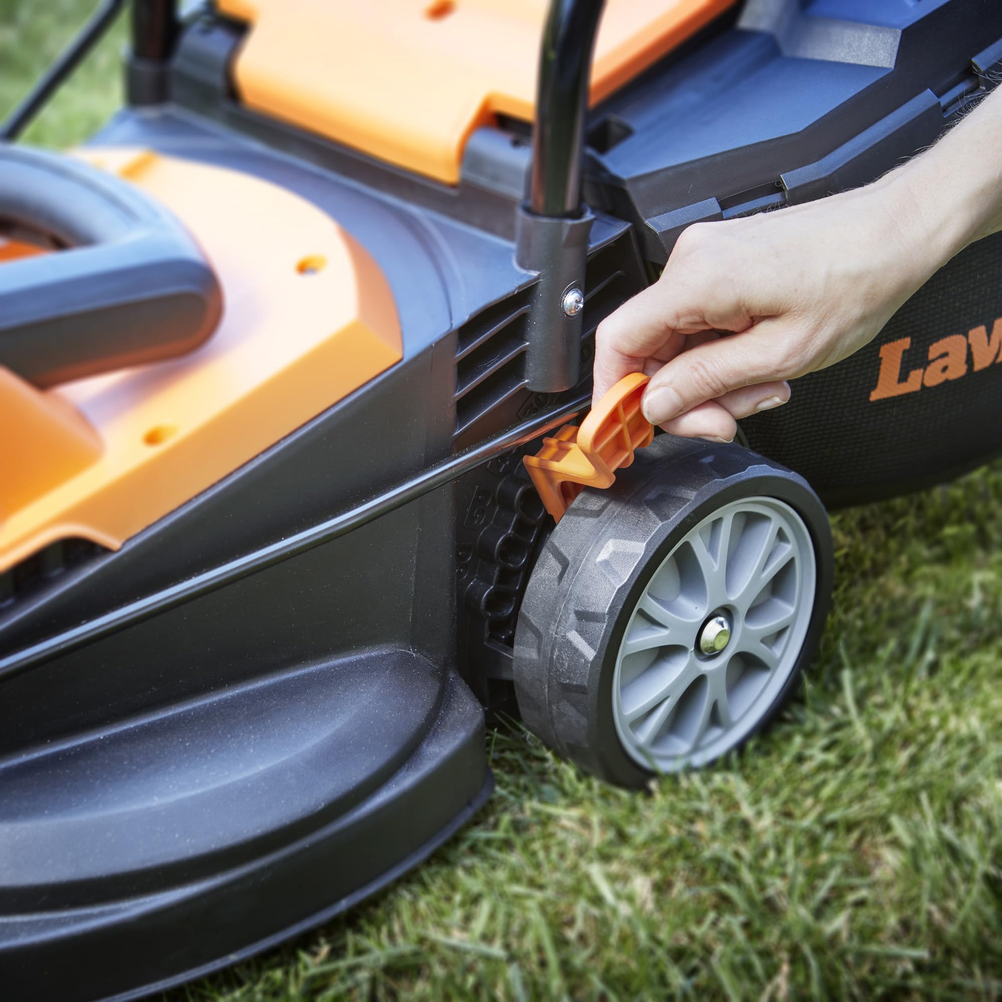 LawnMaster 1200W Electric Lawn Mower with 32cm cutting width, ideal for small lawns. With 5 adjustable cutting heights and rear roller for striped finish, 2 year guarantee